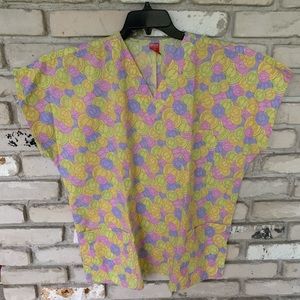 Nestle nurse scrubs with sweetarts design.…